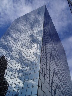 [Reflective PSE&G building merges into sky]